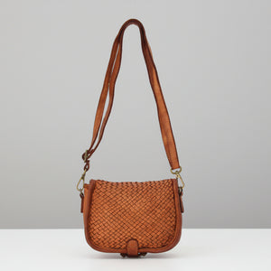 Brown woven handbag with a strap 