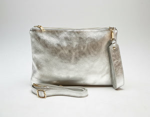 Silver metallic clutch bag with a strap 