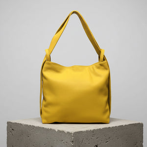 yellow leather handbag